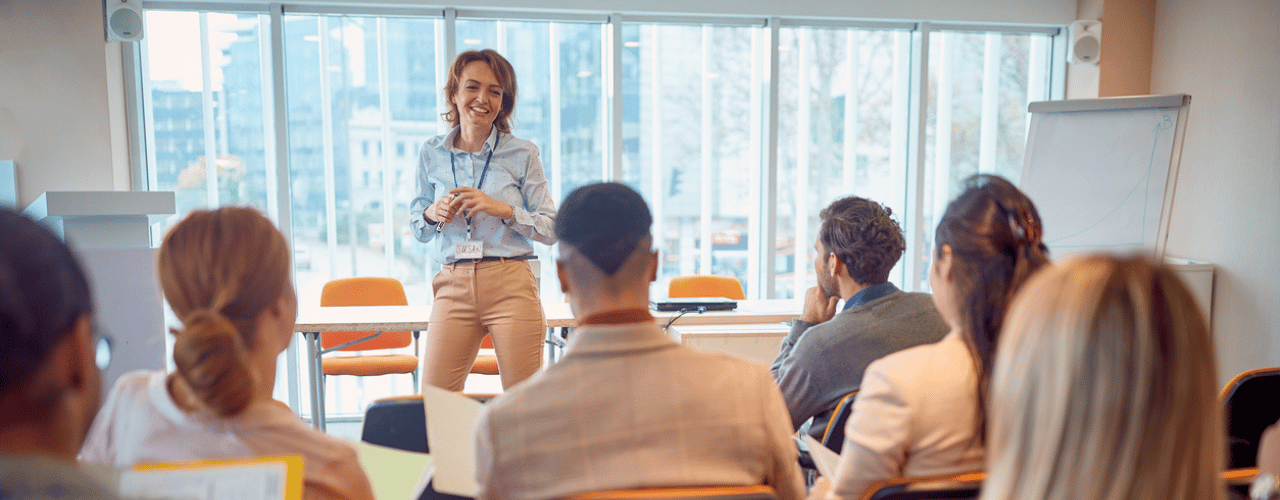 Sales manager coaching team with pipeline review and coaching session