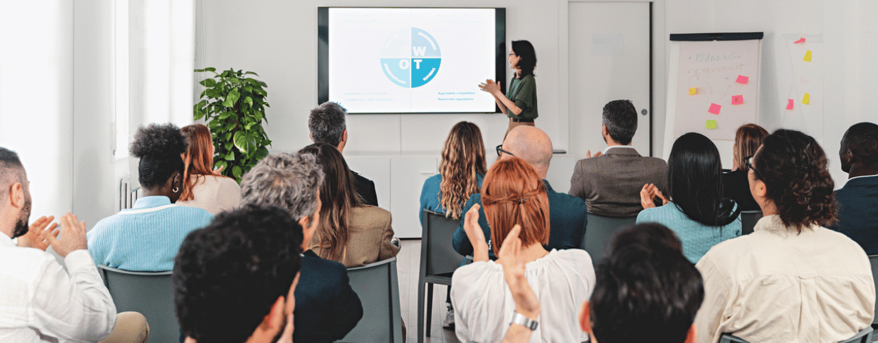 Sales team in a training session reviewing skills, coaching cadence and deal artefacts for 2026 performance